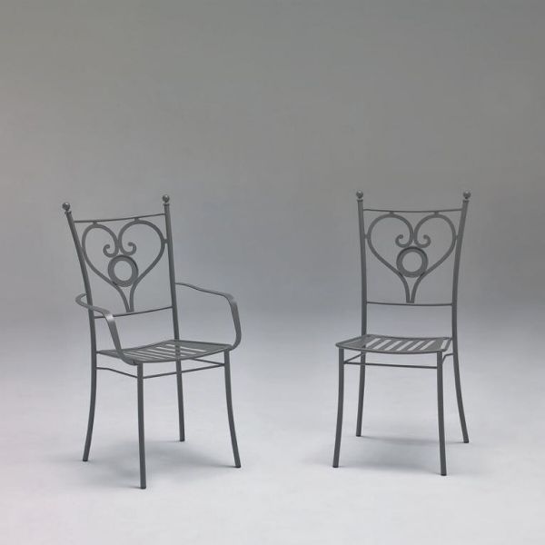 SET OF 2 ARMCHAIRS made of stainless steel